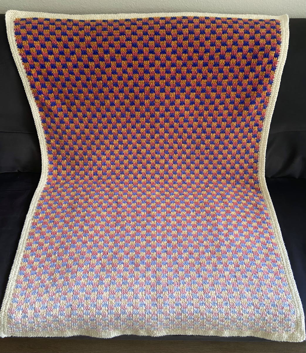 four crochet beanies